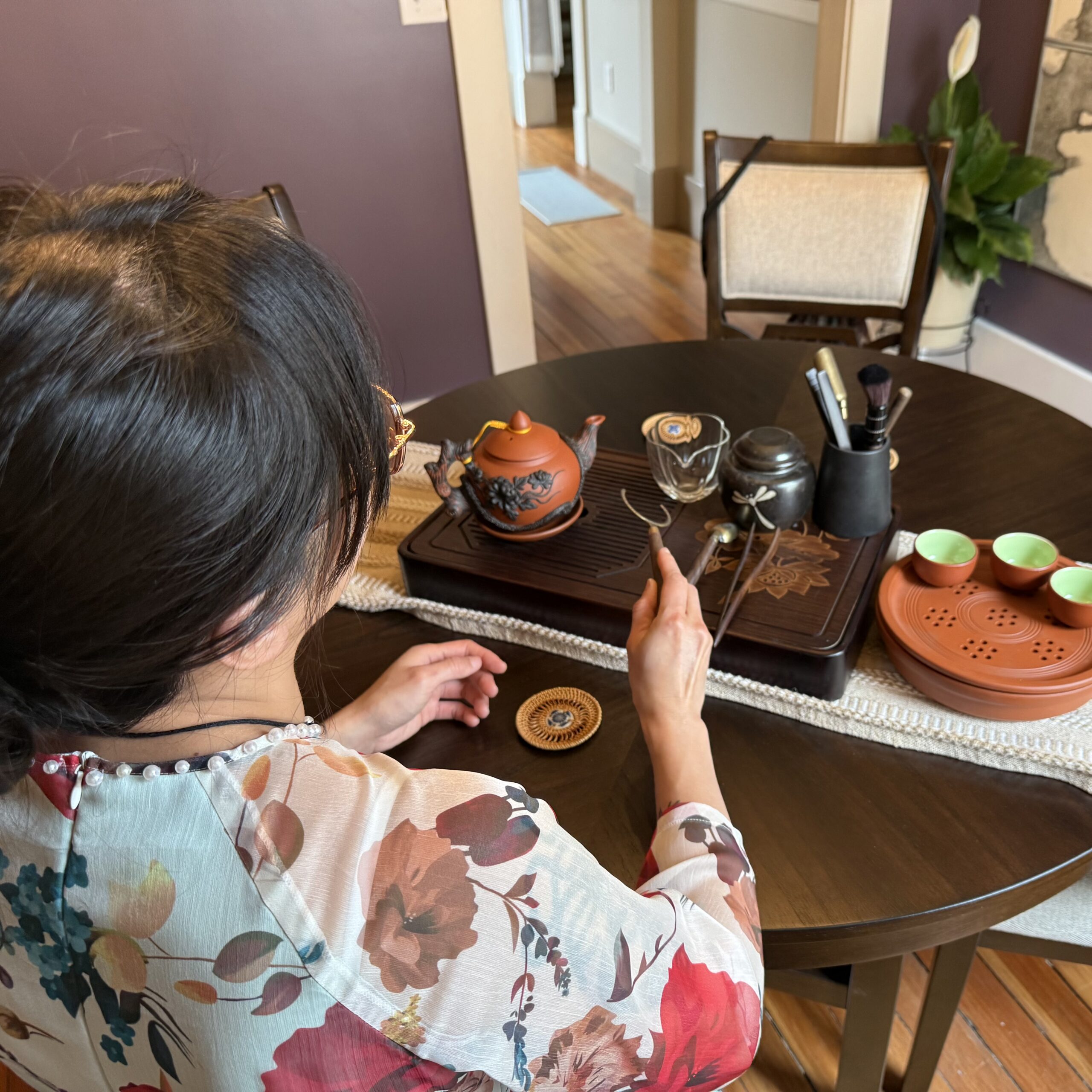 Anh preparing for an Asian Tea Cermony