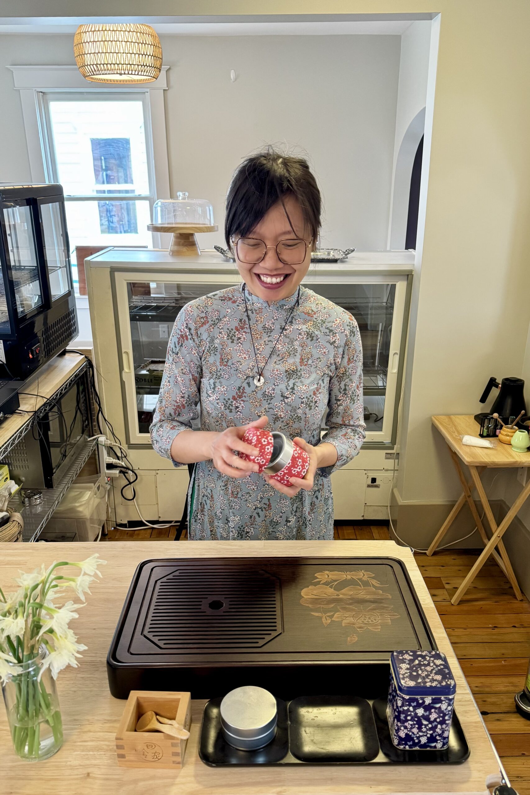 Anh at her tea set, preparing to make matcha